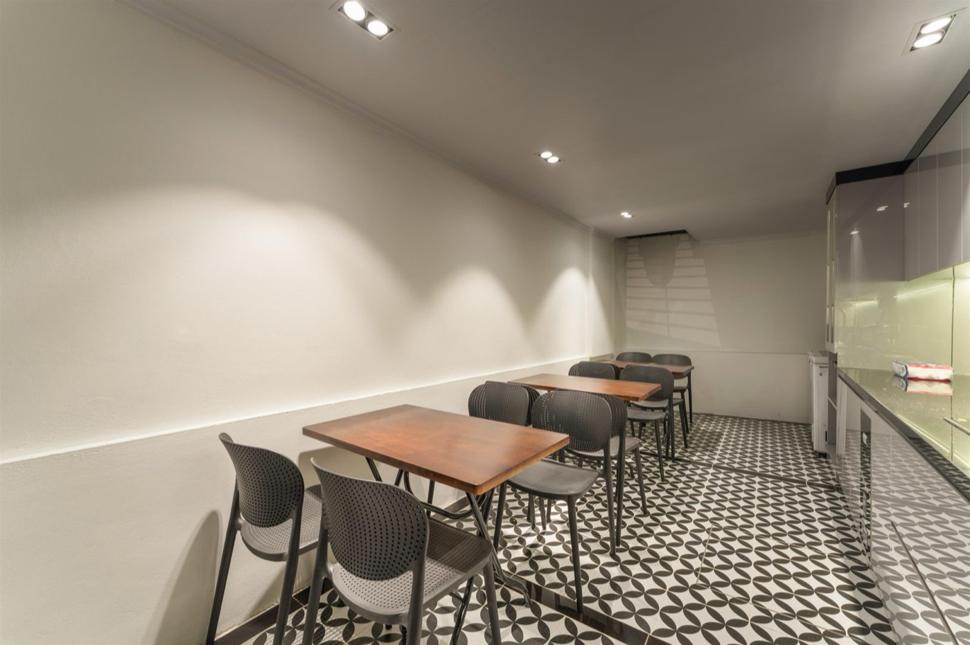 Breakfast tables beside the kitchen