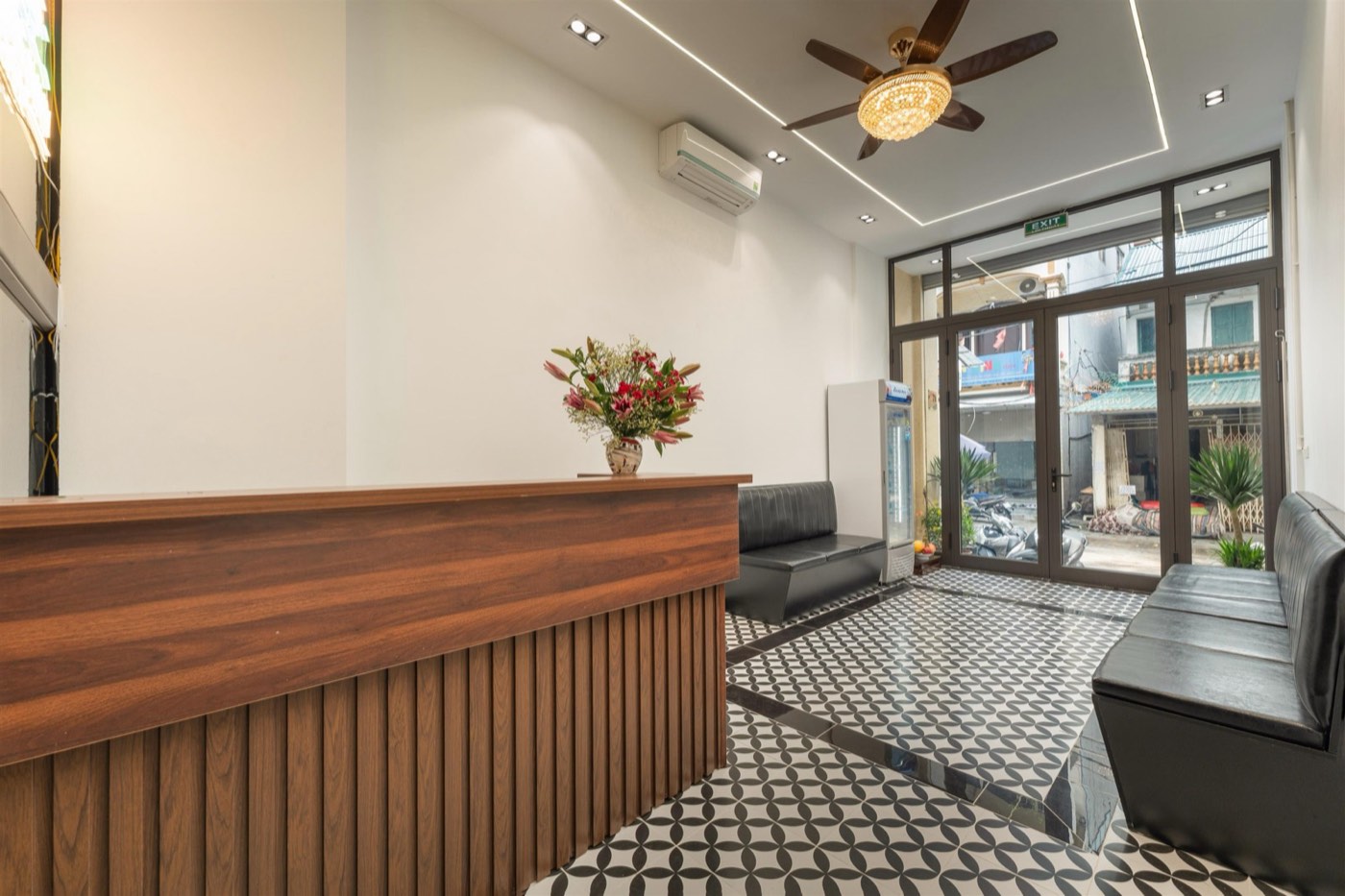 Front desk and lobby with patterned tiles