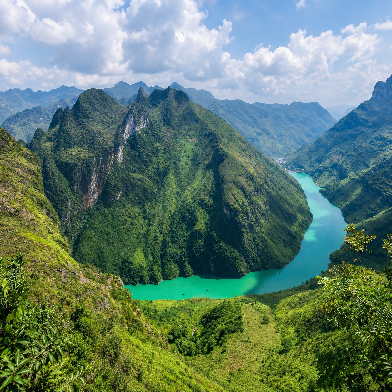 The Nho Quế River curving around a steep green mountain seen from Mã Pí Lèng